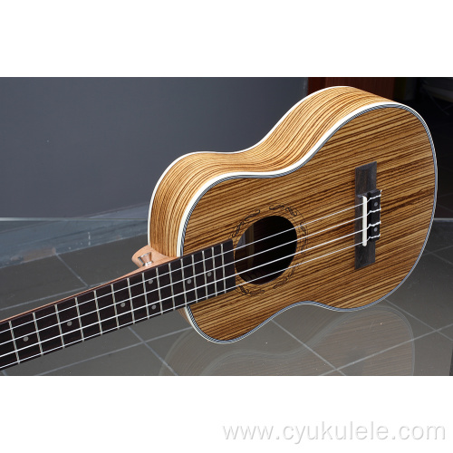 Zebra wood ukulele lettering